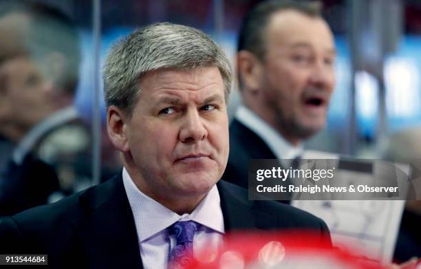 Carolina Hurricanes head coach Bill Peters watches the action during the first period against the Detroit Red Wings at PNC Arena in Raleigh, N.C., on...