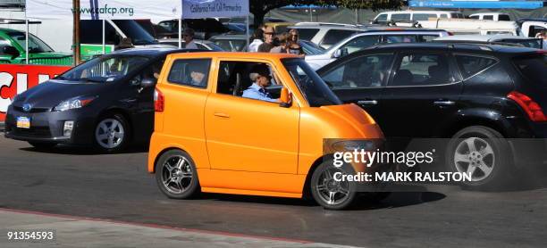 The Tango, an electric powered car that bills itself as the "World's Fastest Urban Car" and can do 0-60 mph in 4 seconds, is displayed at the fourth...