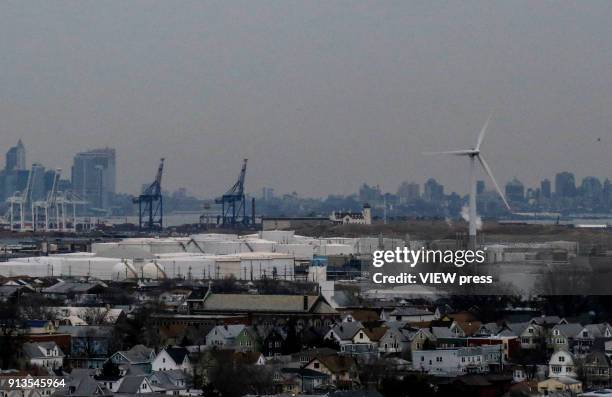 View of a wind turbine is seen from Bayonne Bridge as the New York City Skyline is seen on the background on February 01, 2018 in Bayonne, New...