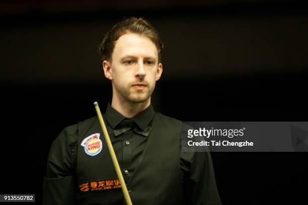 Judd Trump of England reacts in his quarter-final match against Ding Junhui of China on day three of 2018 D88 German Masters at Tempodrom on February...