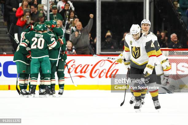Vegas Golden Knights right wing Pierre-Edouard Bellemare , right, reacts after Minnesota Wild defenseman Jared Spurgeon scored in the 2nd period...