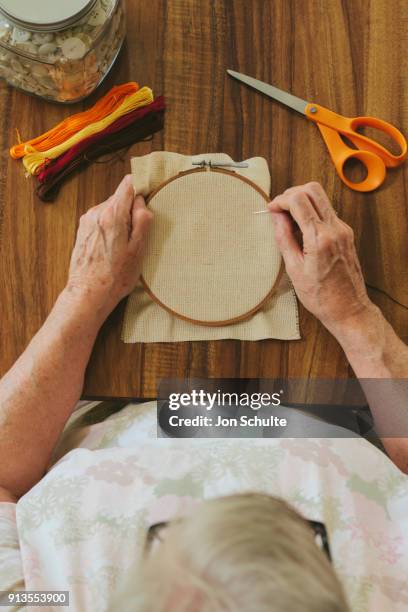 old lady sewing - west chester, ohio stock pictures, royalty-free photos & images