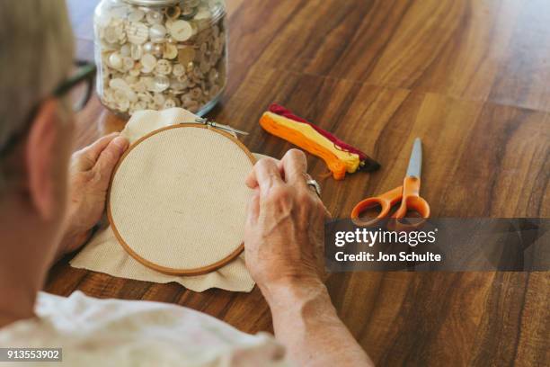 old lady sewing - west chester, ohio stock pictures, royalty-free photos & images