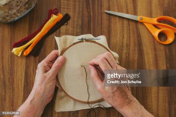 old lady sewing - west chester, ohio stock pictures, royalty-free photos & images