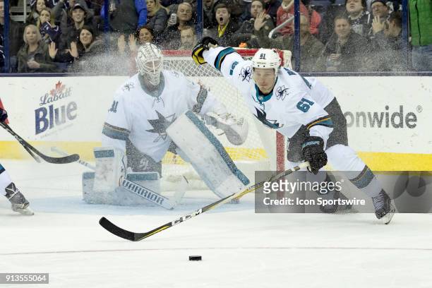 San Jose Sharks defenseman Justin Braun sprints towards the puck in the third period of a game between the Columbus Blue Jackets and the San Jose...