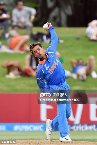 Abhishek Sharma of India bowls during the ICC U19 Cricket World Cup Final match between Australia and India at Bay Oval on February 3, 2018 in...
