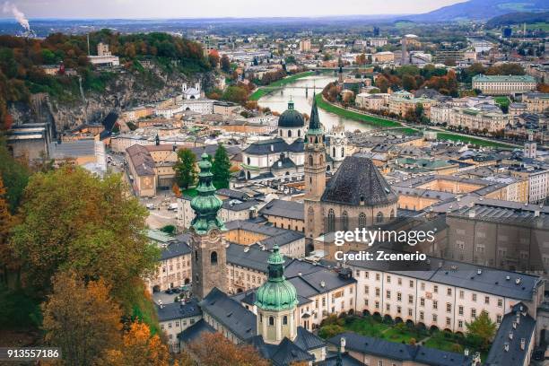 aerial view from the roof of hohensalzburg fortress in the city of salzburg, austria during autumn - giardini di mirabell foto e immagini stock