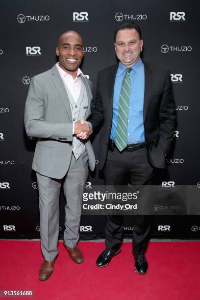 Tiki Barber and Drew Rosenhaus arrive at the Thuzio & Rosenhaus Party during Super Bowl weekend at The Exchange & Alibi Lounge on February 2, 2018 in...