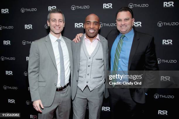 Jared Augustine, Tiki Barber and Drew Rosenhaus arrive at the Thuzio & Rosenhaus Party during Super Bowl weekend at The Exchange & Alibi Lounge on...
