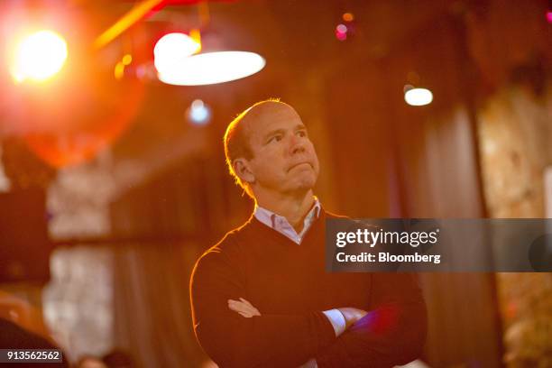 Representative John Delaney, a Democrat from Maryland and 2020 presidential candidate, center, listens as Abby Finkenauer, a current Iowa State...