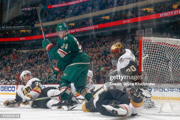 William Karlsson, Nate Schmidt, and goalie Malcolm Subban defend their goal against Mikael Granlund of the Minnesota Wild during the game at the Xcel...