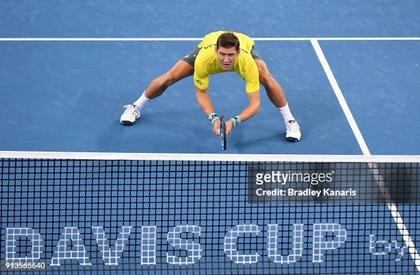 Matt Ebden of Australia is prepared for the serve return in the doubles match with John Peers against Jan-Lennard Struff and Tim Putz of Germany...