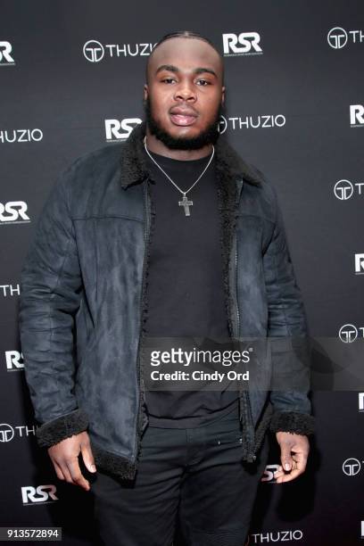 Grady Jarrett arrives at the Thuzio & Rosenhaus Party during Super Bowl weekend at The Exchange & Alibi Lounge on February 2, 2018 in Minneapolis,...