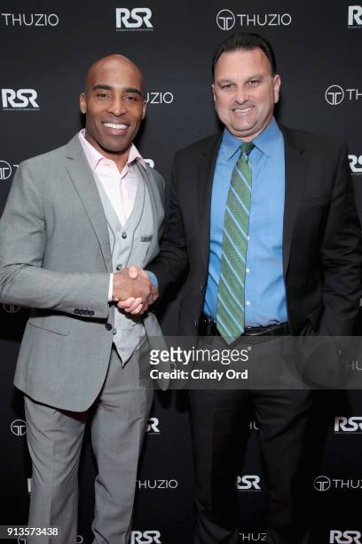 Tiki Barber and Drew Rosenhaus arrive at the Thuzio & Rosenhaus Party during Super Bowl weekend at The Exchange & Alibi Lounge on February 2, 2018 in...
