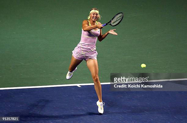 Maria Sharapova of Russia plays a forehand in the women's final match against Jelena Jankovic of Serbia during day seven of the Toray Pan Pacific...