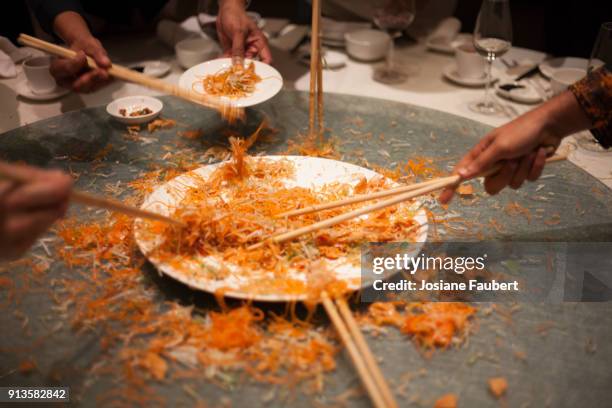 chinese new year food- yusheng - prosperity toss stock pictures, royalty-free photos & images