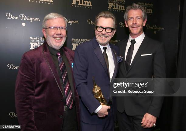 Leonard Maltin, Gary Oldman and Ben Mendelsohn pose backstage with the Matlin Modern Master Award at the Maltin Modern Master Award Honoring Gary...