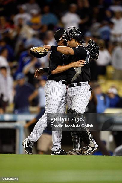 Huston Street, and Yorvit Torrealba of the Colorodo Rockies Celebrates winning against the Los Angeles Dodgers on October 2, 2009 in Los Angeles,...