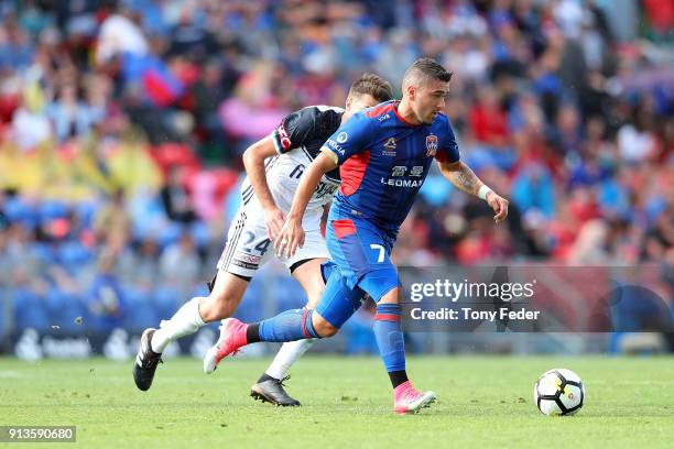 Dimitris Petratos of the Jets controls the ball during the round 19 A-League match between the Newcastle Jets and the Melbourne Victory at McDonald...