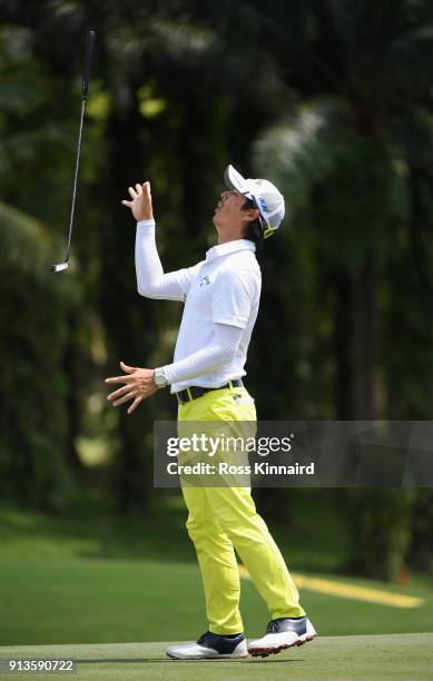 Ryo Ishikawa of Japan reacts after his birdie attempt on the par four 9th hole hole during the third round of the Maybank Championship Malaysia at...