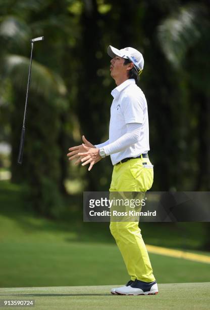 Ryo Ishikawa of Japan reacts after his birdie attempt on the par four 9th hole hole during the third round of the Maybank Championship Malaysia at...