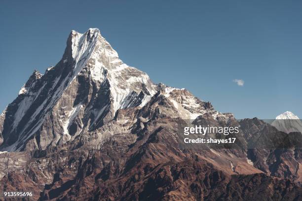 machapuchare daytime close-up - machapuchare stock pictures, royalty-free photos & images