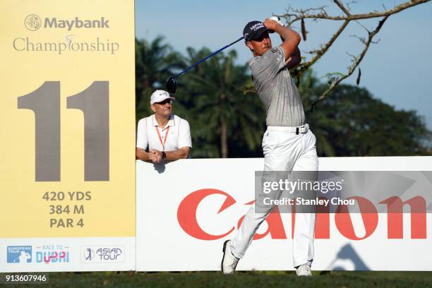 Henrik Stensen of Sweden hits a tee shot on the 11th hole during day three of the 2018 Maybank Championship Malaysia at Saujana Golf and Country Club...