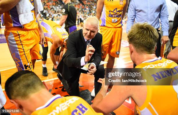 Kings coach Andrew Gaze speaks to his players at a timeout during the round 17 NBL match between the Cairns Taipans and the Sydney Kings at Cairns...