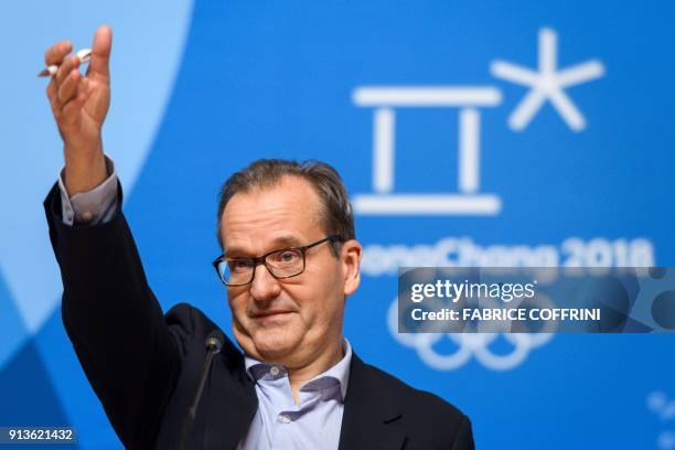 International Olympic Committee spokesman Mark Adams gestures during a press briefing for an IOC executive meeting in Pyeongchang on February 3,...