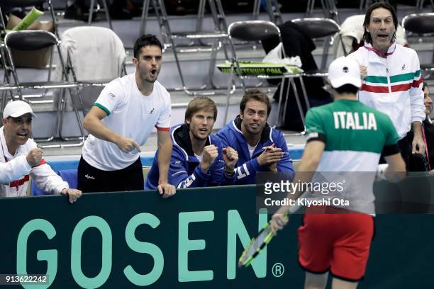 Thomas Fabbiano , Andreas Seppi and Paolo Lorenzi of Italy cheer for their team mates in the doubles match between Ben McLachlan and Yasutaka...