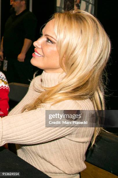 Actress Pamela Anderson signs autographs as she attends the '25th Paris Manga & Sci-Fi Show' at Parc des Expositions Porte de Versailles on February...