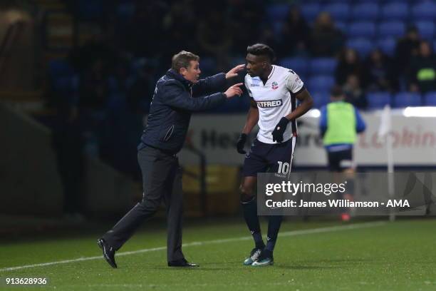 Bolton Wanderers manager Phil Parkinson and Sammy Ameobi of Bolton Wanderers during the Sky Bet Championship match between Bolton Wanderers and...