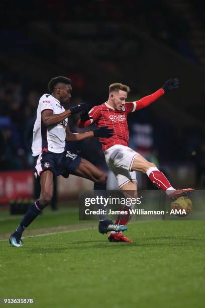 Sammy Ameobi of Bolton Wanderers and Josh Brownhill of Bristol City during the Sky Bet Championship match between Bolton Wanderers and Bristol City...