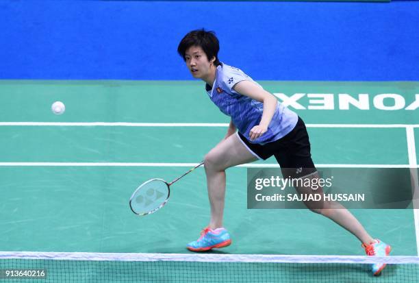 Hong Kong badminton player Cheung Ngan Yi plays a return against United States badminton player Beiwen Zhang during their women's singles semi-final...