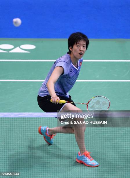 Hong Kong badminton player Cheung Ngan Yi plays a return against United States badminton player Beiwen Zhang during their women's singles semi-final...