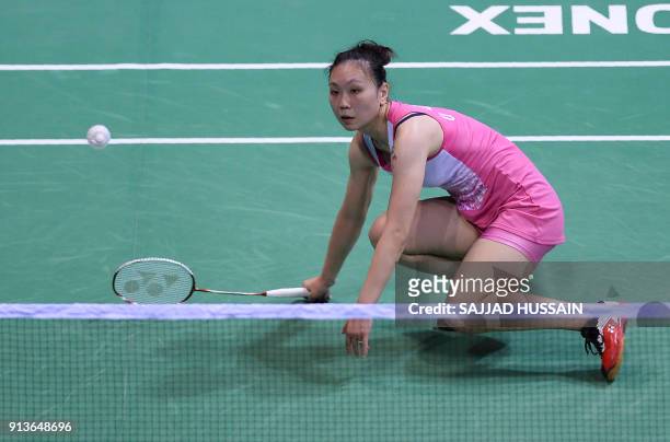 United States badminton player Beiwen Zhang plays a return against Hong Kong badminton player Cheung Ngan Yi during their women's singles semi-final...