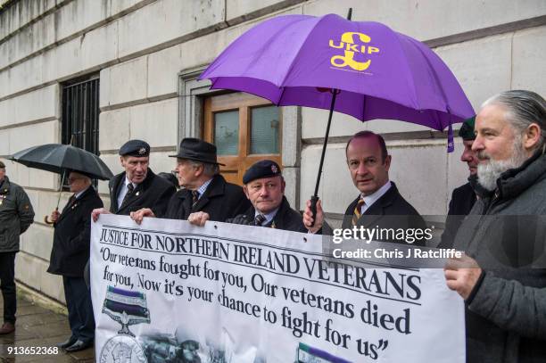 Party leader Henry Bolton amongst veterans during a Justice for Veterans protest at Whitehall on February 3, 2018 in London, England. The Justice for...