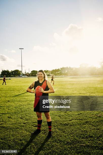 i'm happiest on the field - afl woman stock pictures, royalty-free photos & images