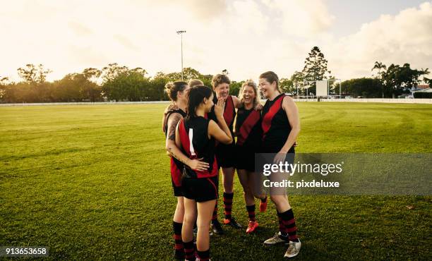 nothing compares to the bond you have with your teammates - afl woman stock pictures, royalty-free photos & images