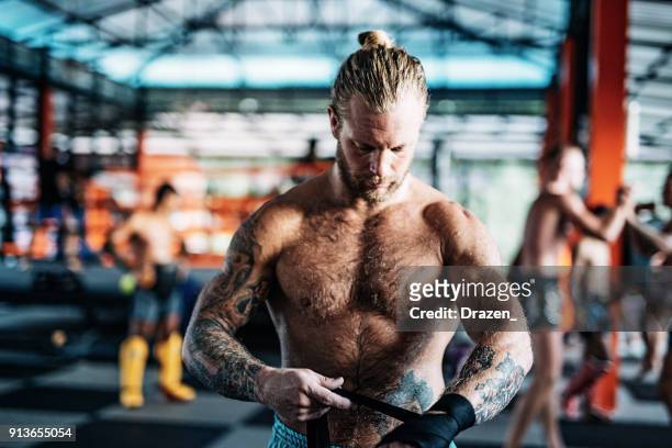 portrait of caucasian adult man preparing mma and kick boxing - mixed martial arts stock pictures, royalty-free photos & images