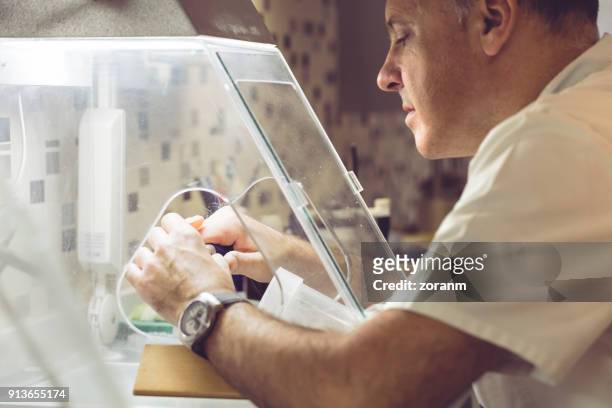 making a dental prosthesis - crown moulding stock pictures, royalty-free photos & images