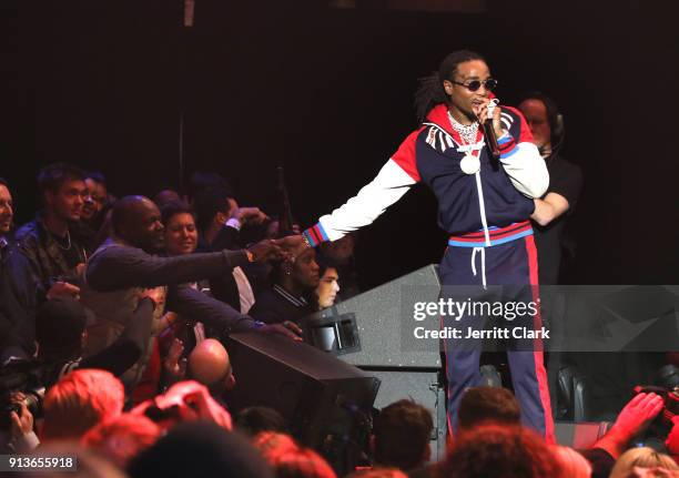 Retired NFL player for Emmitt Smith greets Quavo of Migos during his performance at Rolling Stone Live: Minneapolis Presented by Mercedes-Benz and...