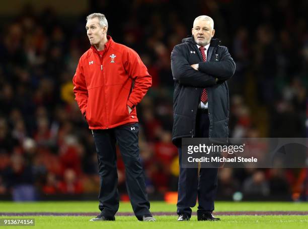 Rob Howley and Warren Gatland, Head coach of of Wales look on prior to the Natwest Six Nations round One match between Wales and Scotland at...