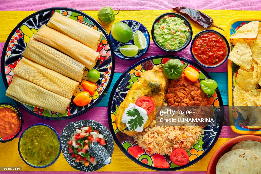 Tamale with corn leaf and filled chili pepper
