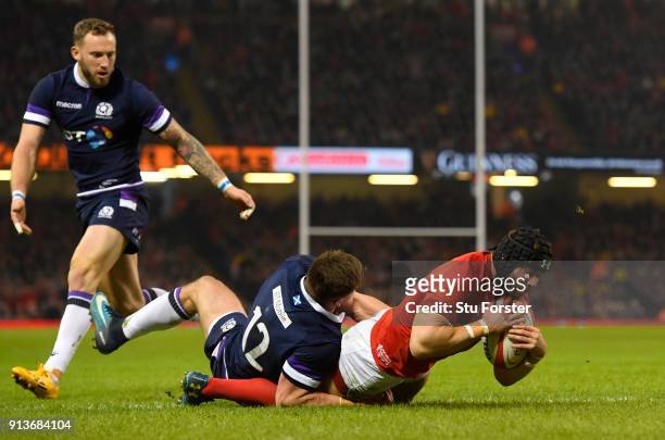 Leigh Halfpenny of Wales touches down for the second try during the Natwest Six Nations round One match between Wales and Scotland at Principality...