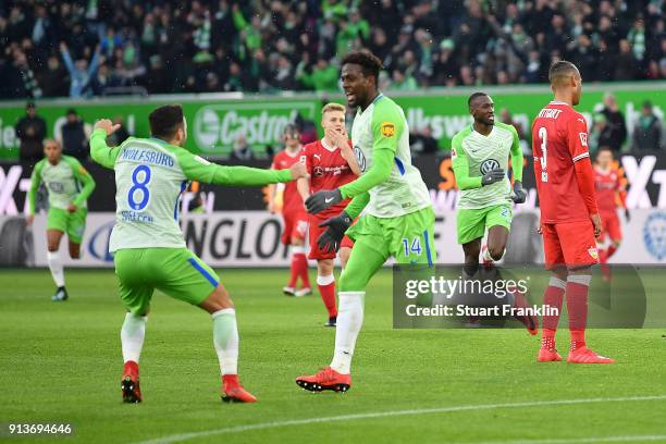 Divock Origi of Wolfsburg celebrates after he score a goal to make it 1:0 during the Bundesliga match between VfL Wolfsburg and VfB Stuttgart at...