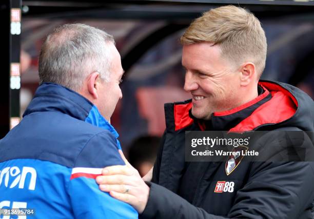 Paul Lambert, Manager of Stoke City and Eddie Howe, Manager of AFC Bournemouth speak prior to the Premier League match between AFC Bournemouth and...