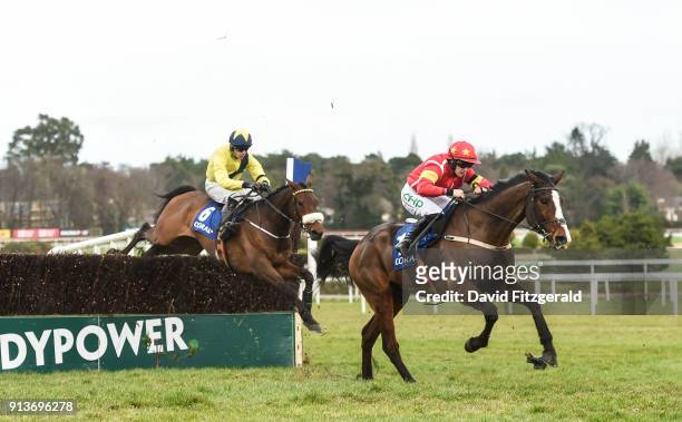 Dublin , Ireland - 3 February 2018; Patricks Park, with Rachael Blackmore up, right, after clearing the last ahead of Tully East, with Denis O'Regan...