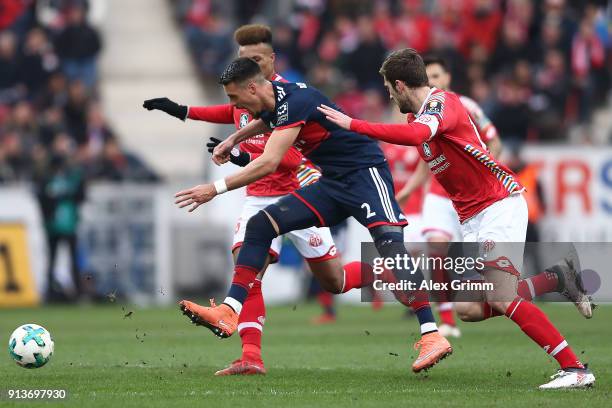 Sandro Wagner of Muenchen fights for the ball with Stefan Bell of Mainz during the Bundesliga match between 1. FSV Mainz 05 and FC Bayern Muenchen at...