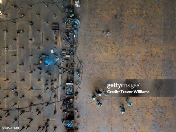 over head view of people meeting in a shipbuilding factory - ship builders stock pictures, royalty-free photos & images